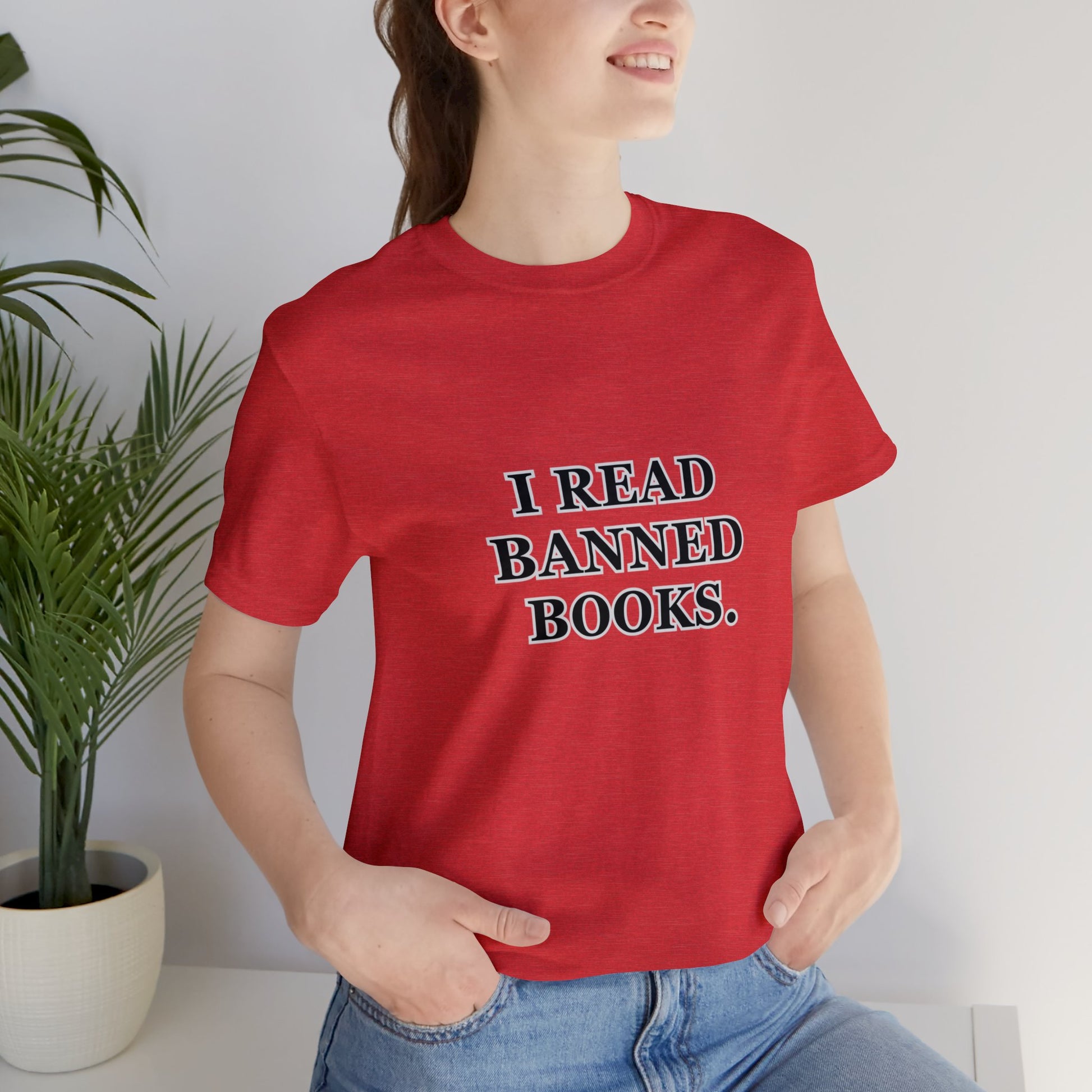 Woman wearing a red t-shirt which reads, I read Banned Books.