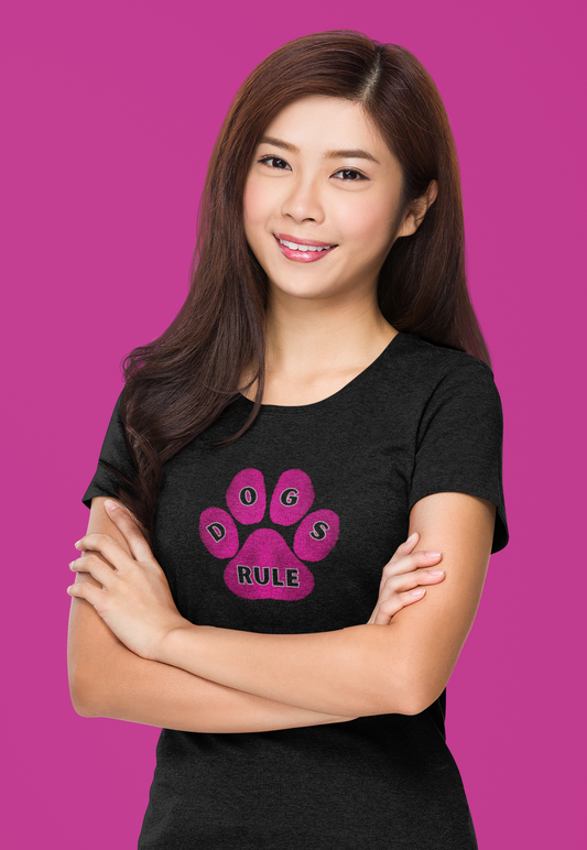 Animals Adult Clothes. Young lady wearing an animal t-shirt with a dog paw and the words, Dogs Rule.