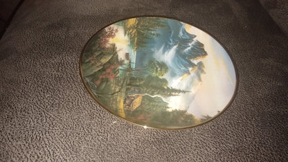 Franklin Mint Heirloom Plate. Side View  Of A Plate Featuring A  Mountain Retreat  With Scenic Mountains In The Background. Created By Ron Huff In 1992.  