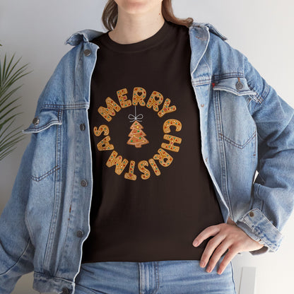 Holiday, Christmas. A woman is wearing a Christmas t-shirt with a wreath made out of gingerbread cookies and spells out Merry Christmas. A Christmas tree cookie dangles in the middle of the wreath.