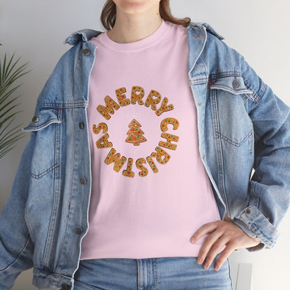 Holiday, Christmas. A woman is wearing a Christmas t-shirt with a wreath made out of gingerbread cookies and spells out Merry Christmas. A Christmas tree cookie dangles in the middle of the wreath.