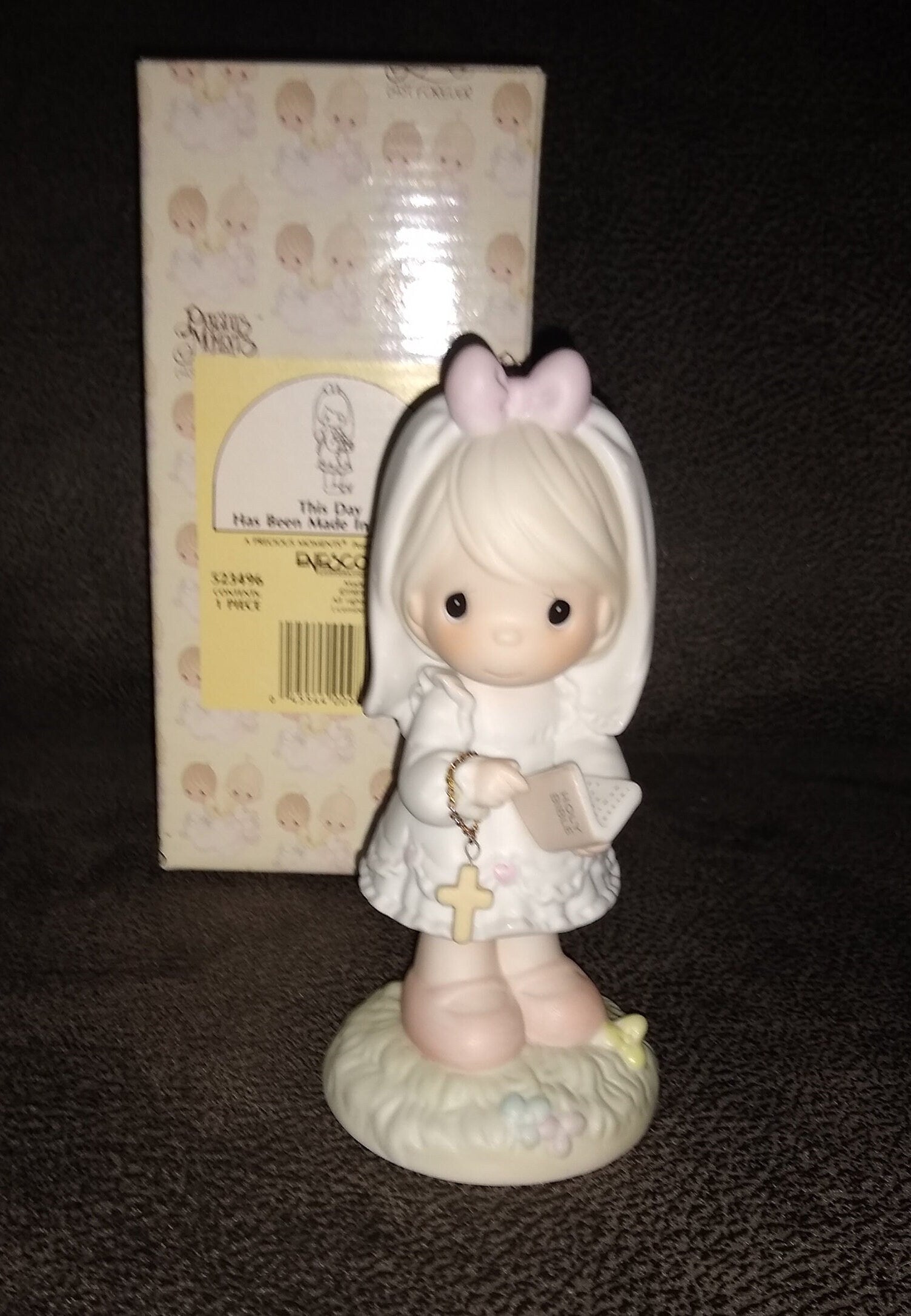 Vintage Precious Moments Figurine Of A Girl Holding A Cross And Bible, This Day Has Been Made In Heaven, Enesco 1989. 