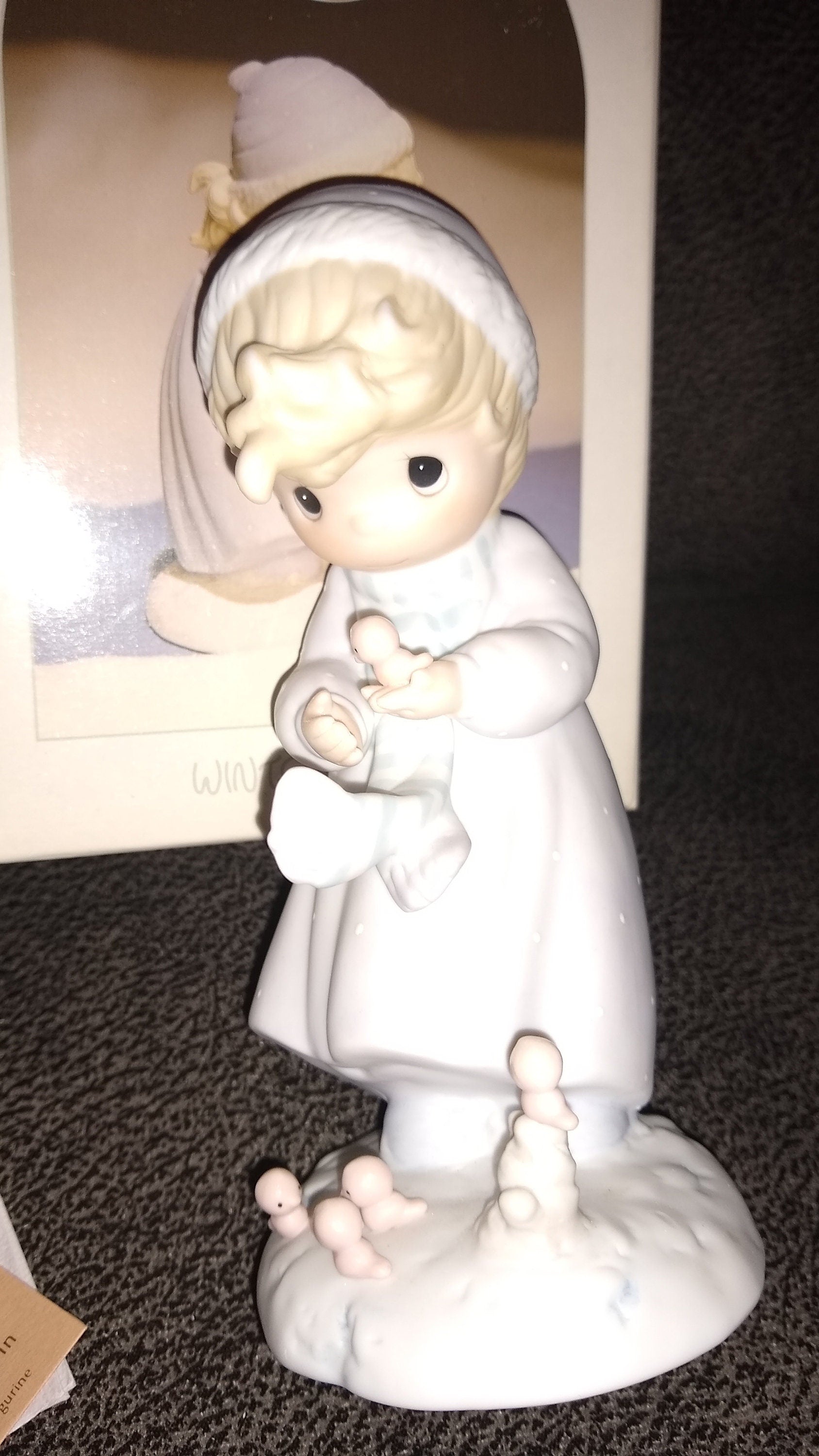 Vintage Precious Moments Figurine Of A Girl Holding A Bird, Winter's Song By Enesco 1984. 